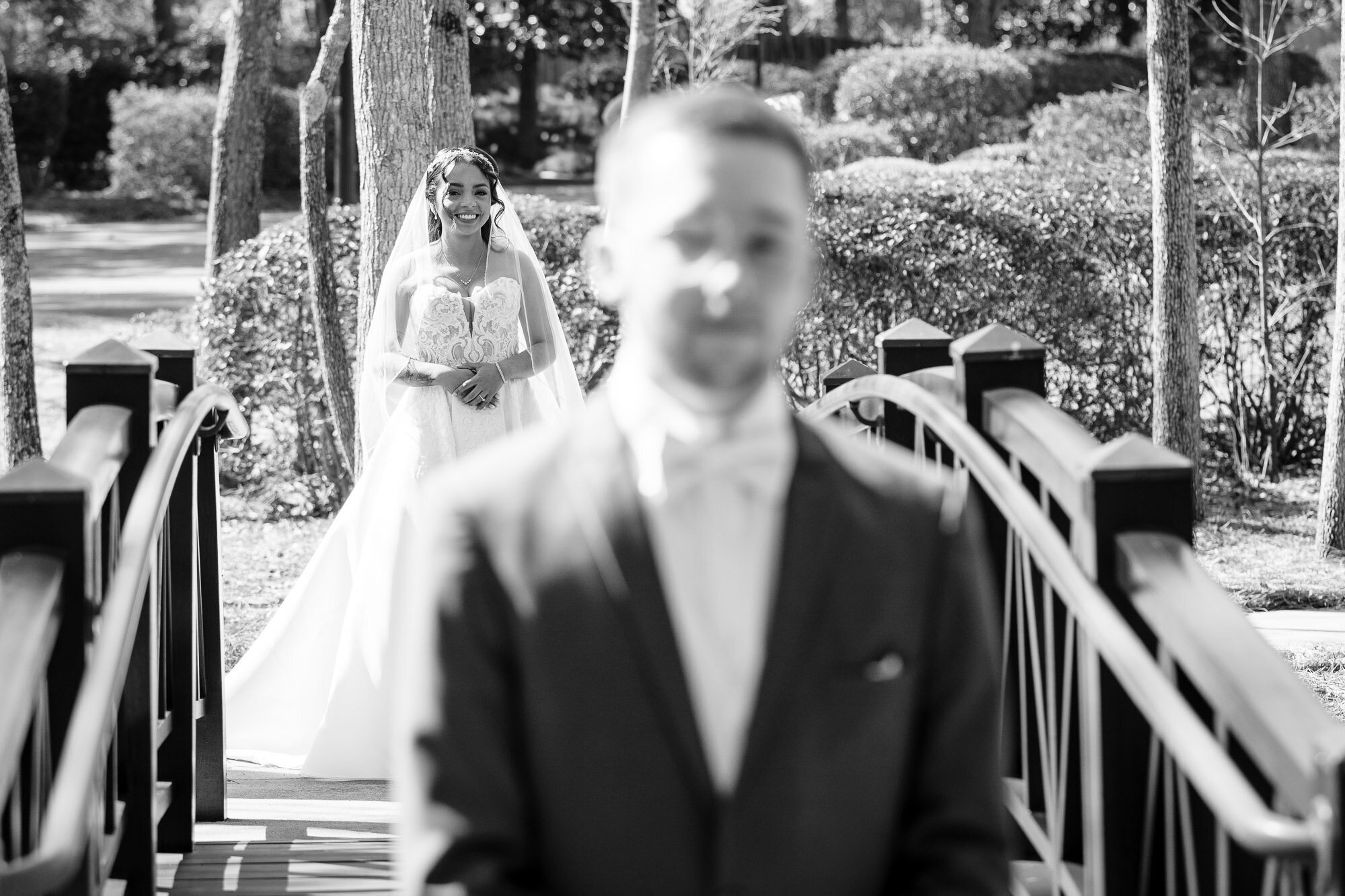 "Bride approaches groom for first look in Landfall"