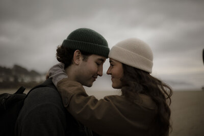 fallback shared on Invalid Date | Couple embraces agains the wild weather of the Oregon coast