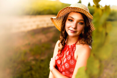 fallback shared on Invalid Date | Beautiful senior girl in Winter Garden Florida close up smiling with a beautiful hat and...