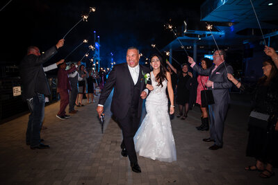 fallback shared on Invalid Date | Bride and groom at wedding exit in San Diego