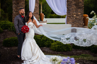 fallback shared on Invalid Date | Bride and groom with flowing veil at San Diego wedding venue