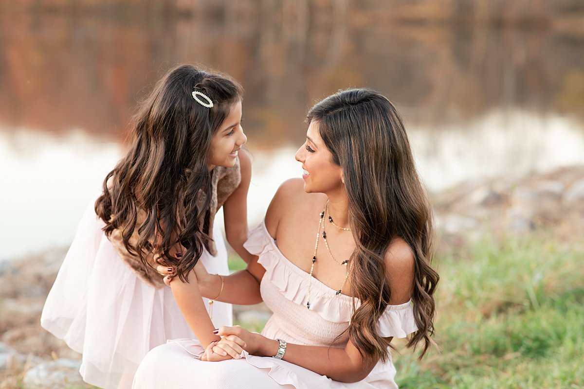 Mom and daughter looking at each other by Maryland Family Photographer