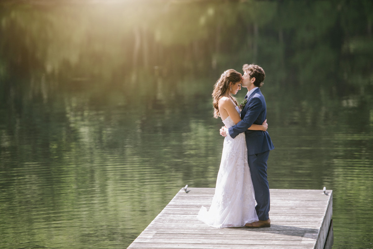 summer golden hour lake cedar lakes estate ny upstate new york kiss wedding couple love bright happy woodland