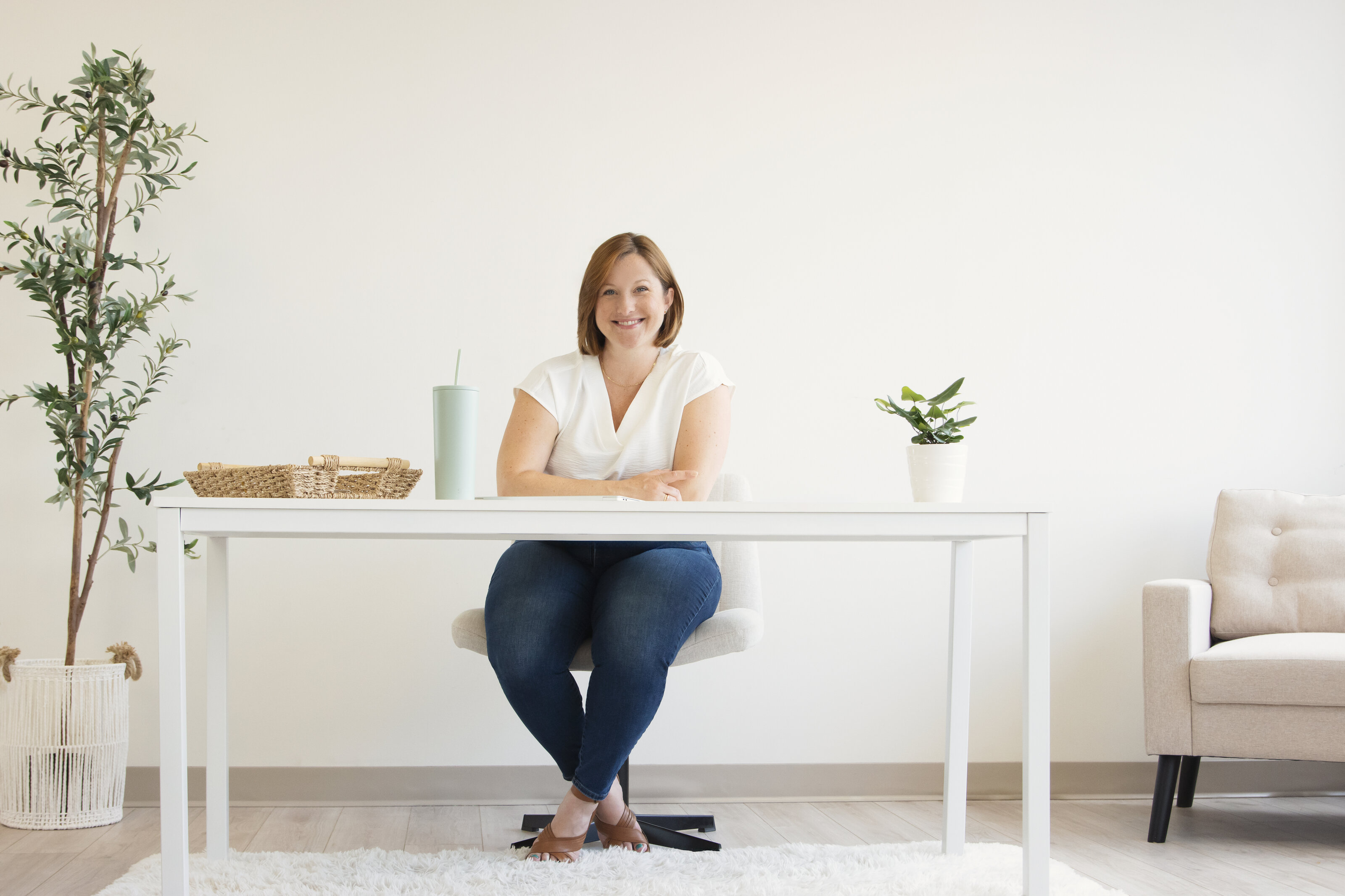 Professional home organizer smiling at the camera during a lifestyle branding session