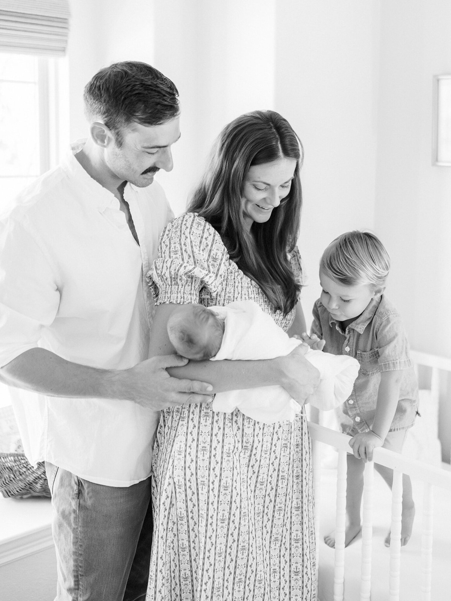Black and white family and newborn session in Dallas