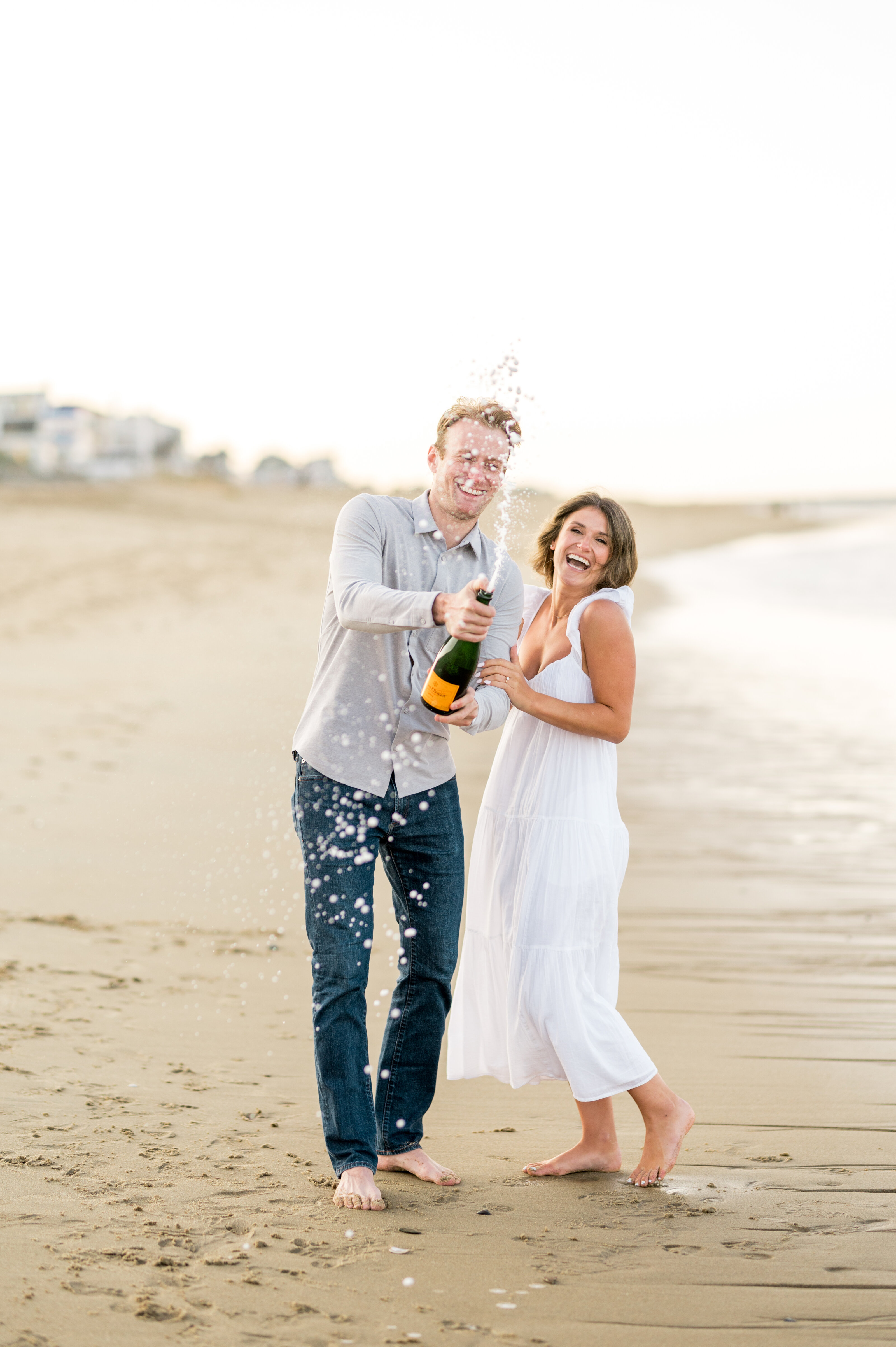 Beach Champagne Pop Engagement Inspo
