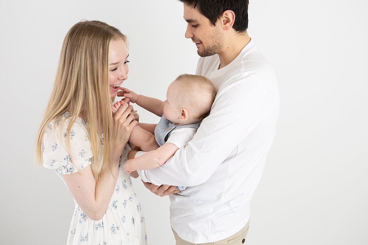 Parents playing with baby boy for Maryland Portrait Session