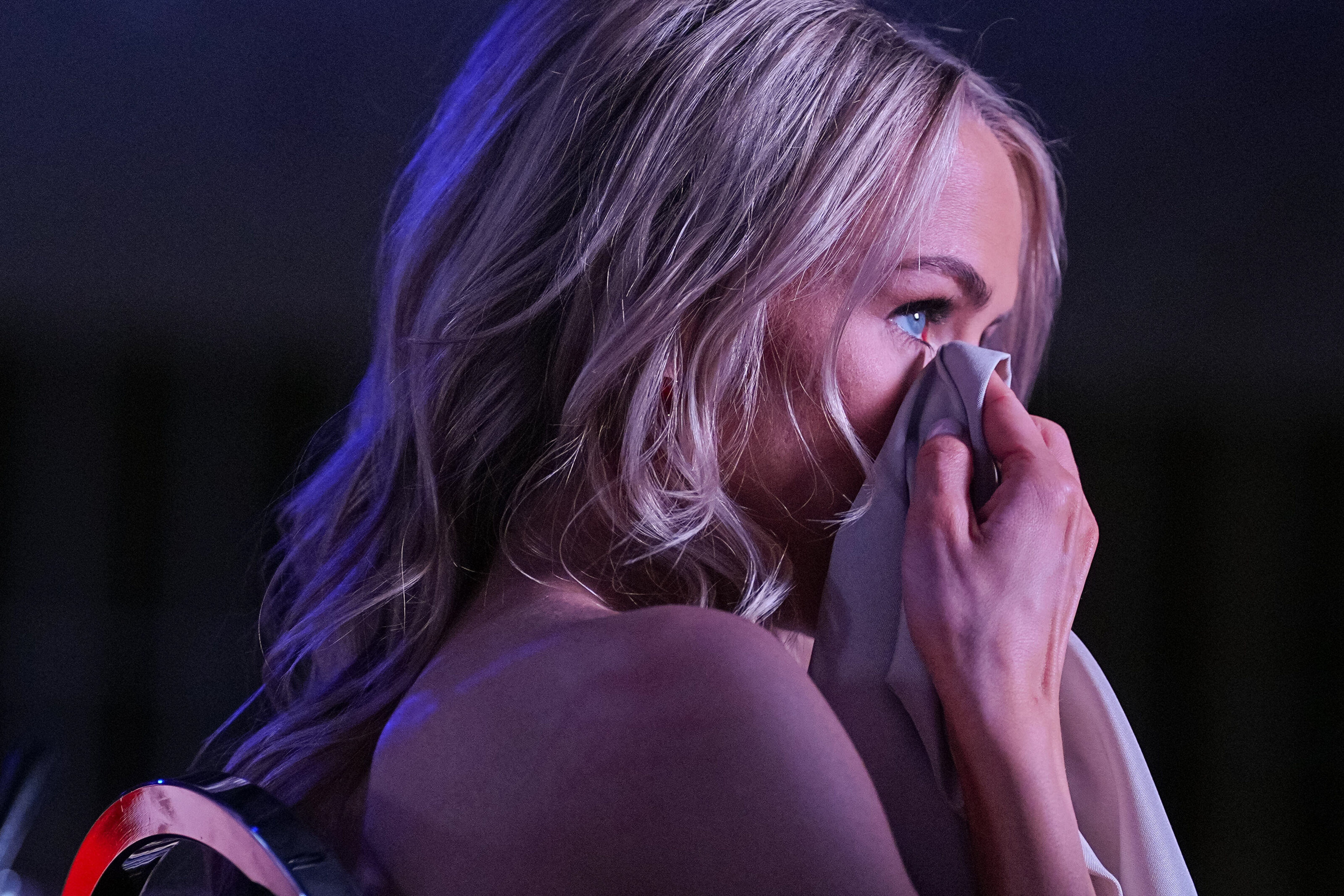kansas-city-event-photography-0068-woman-wiping-tears-at-event