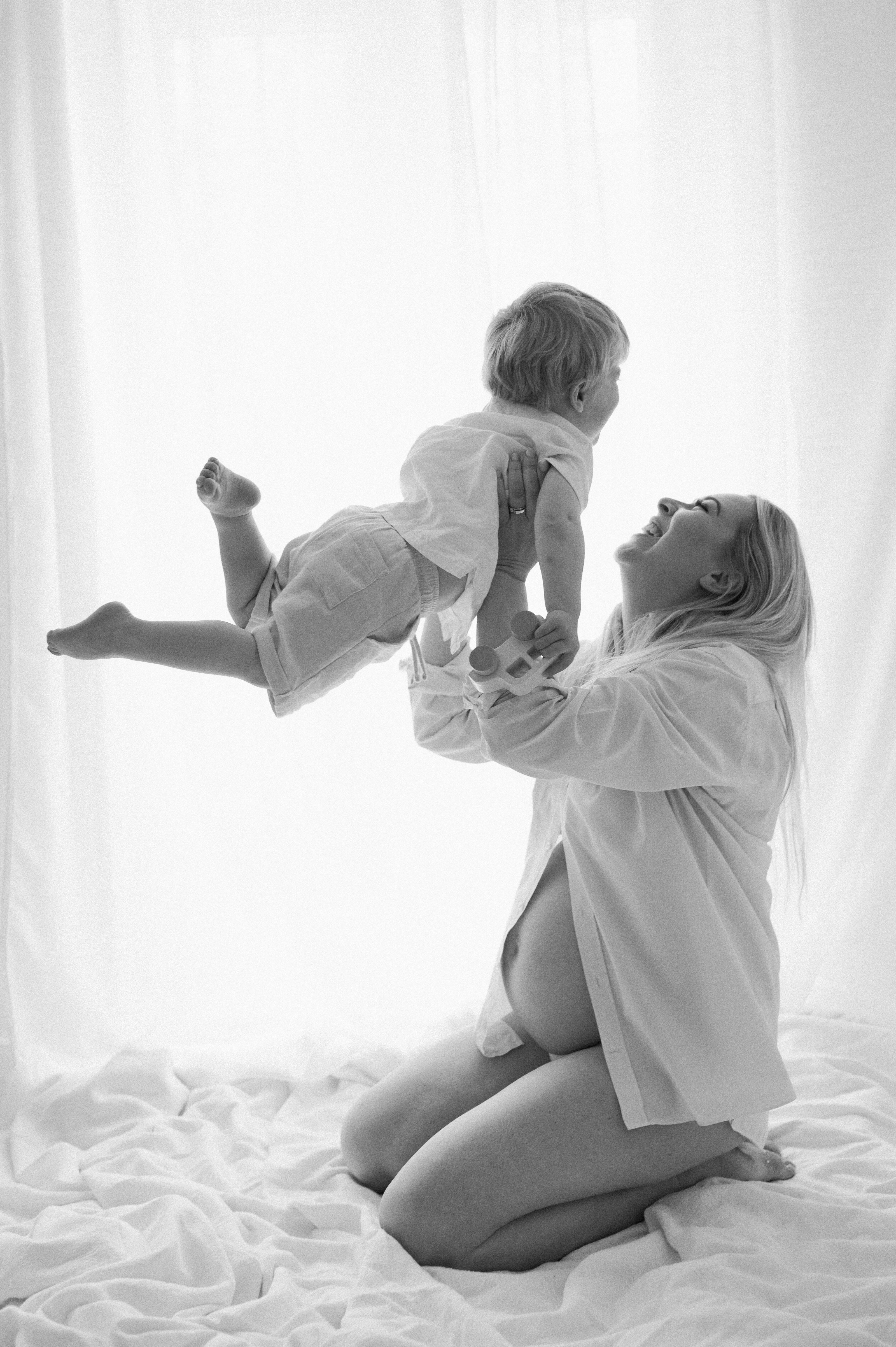 Pregnant Mum with older sibling at maternity photoshoot in central York