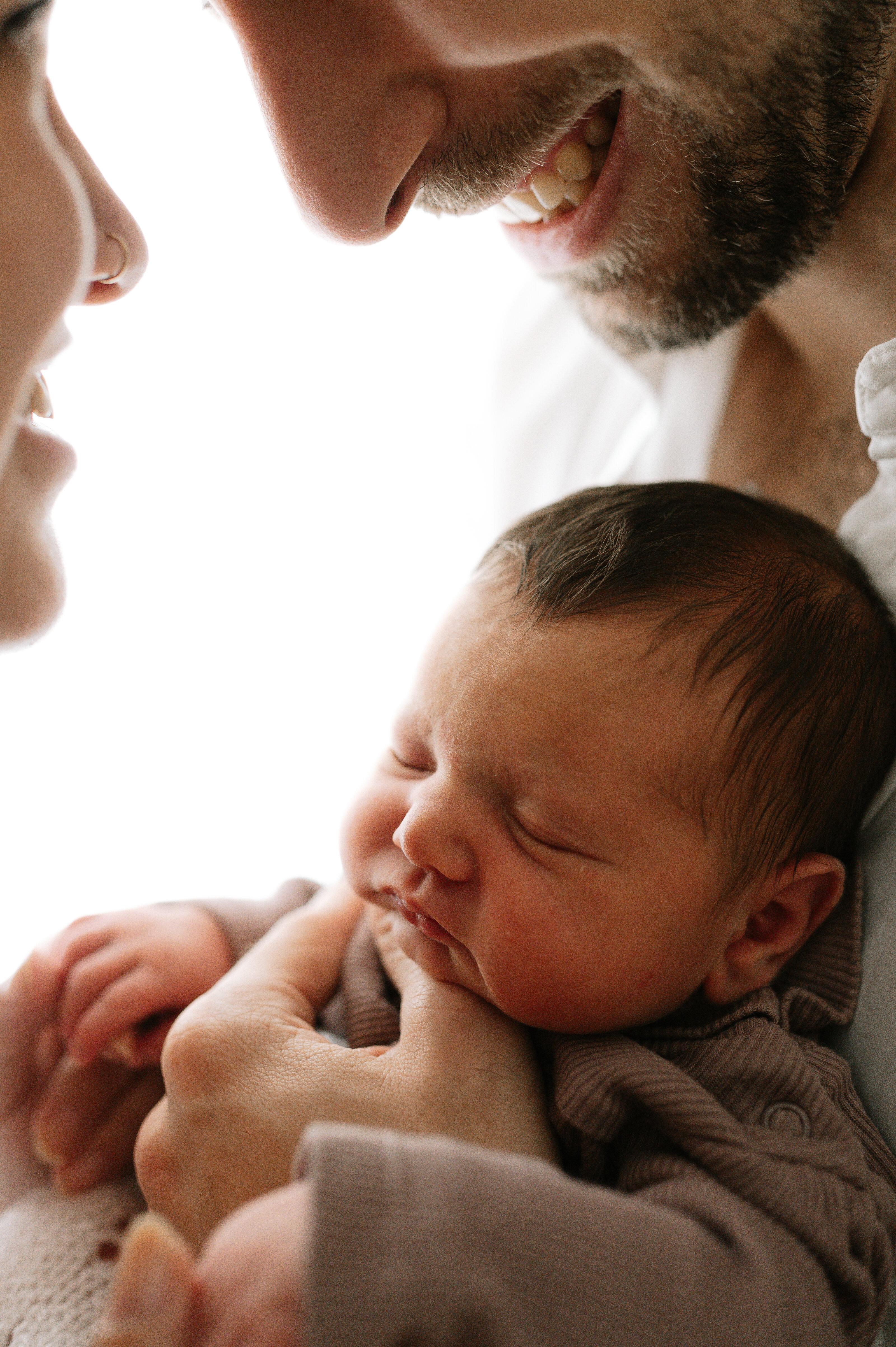 close up of baby girl with Mum and Dad in Yorkshire