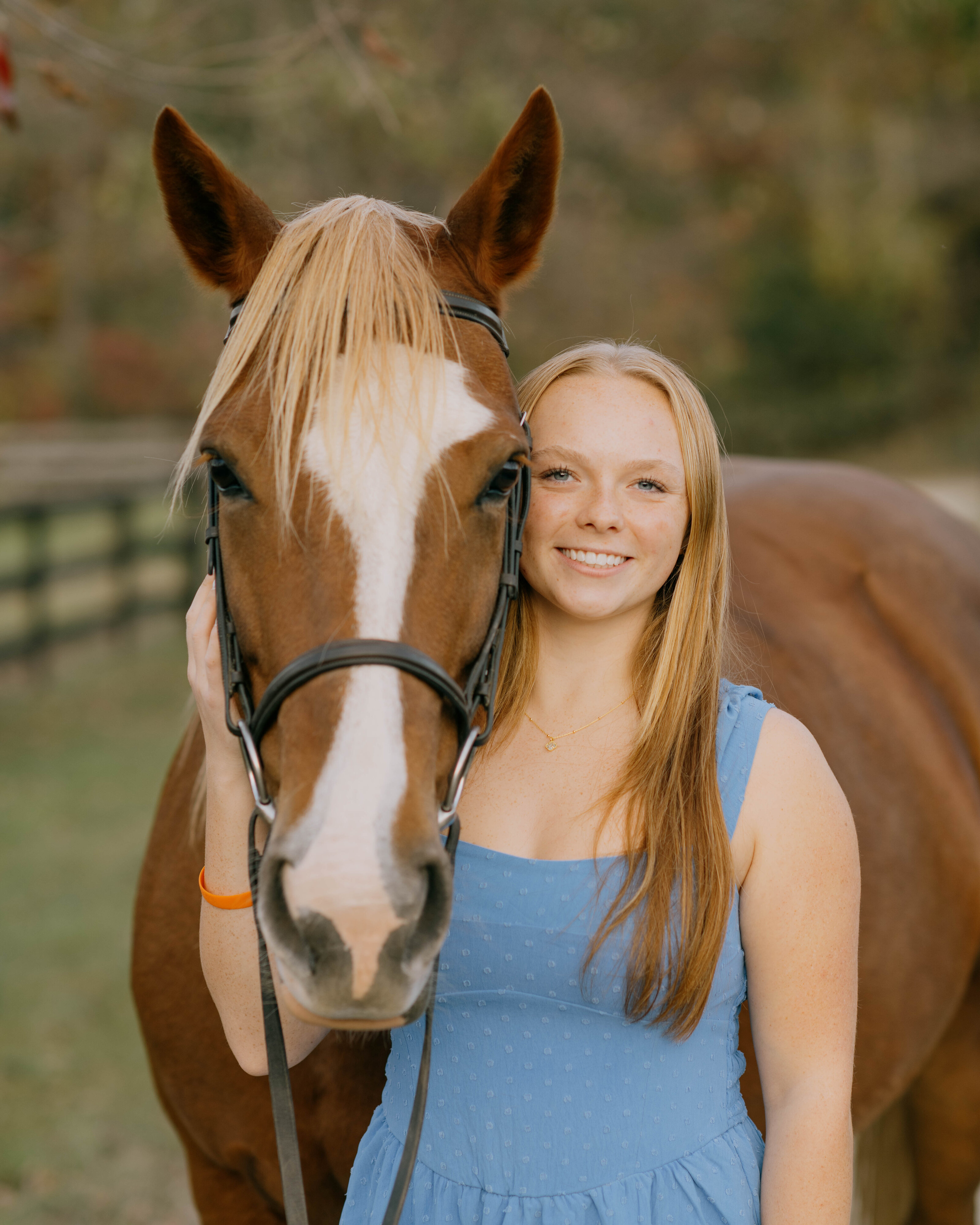 Lucy smiles with her horse in Charlottesville.