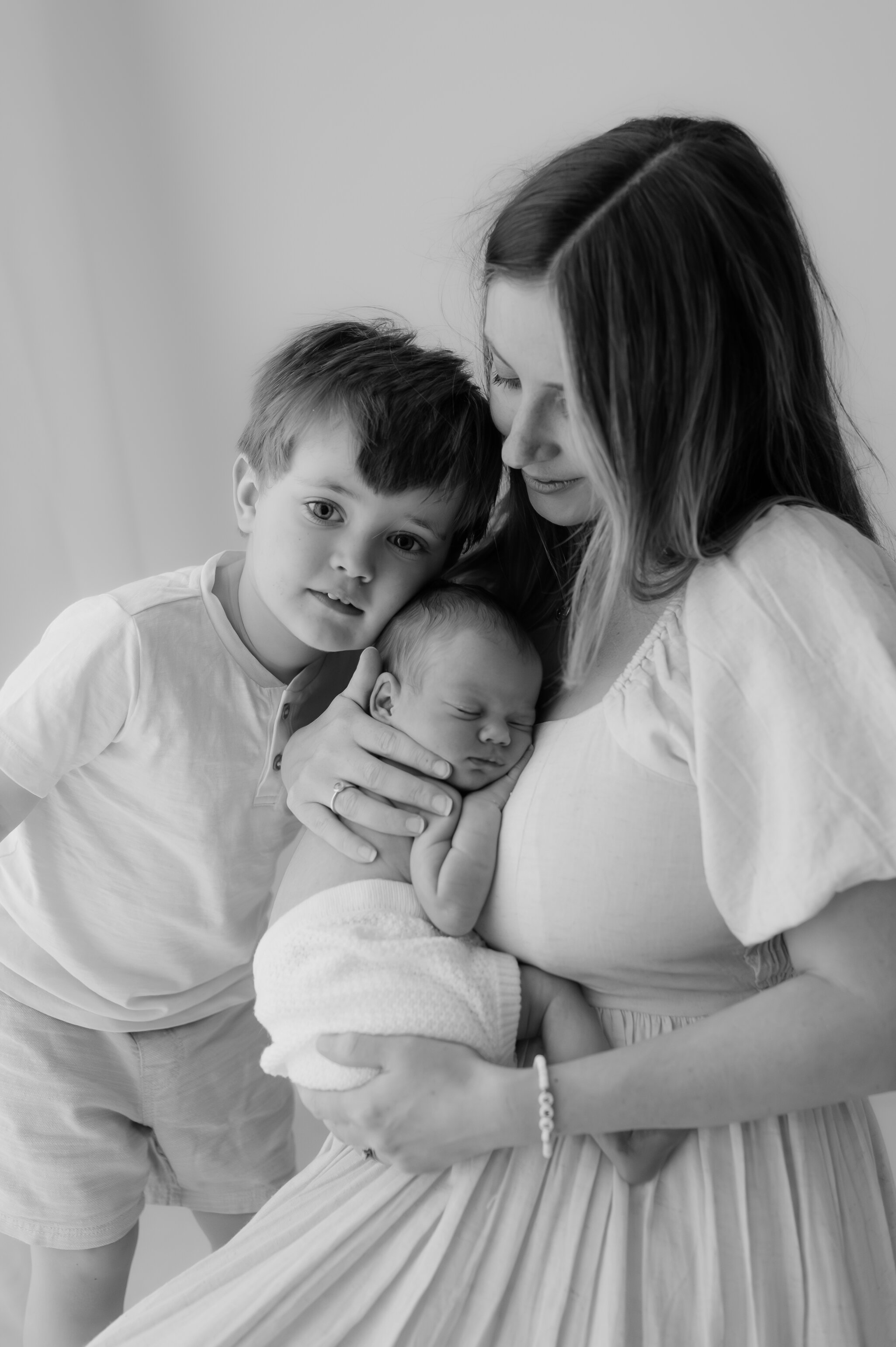 newborn girl, big brother and family at their newborn photography shoot in york, north yorkshire-93