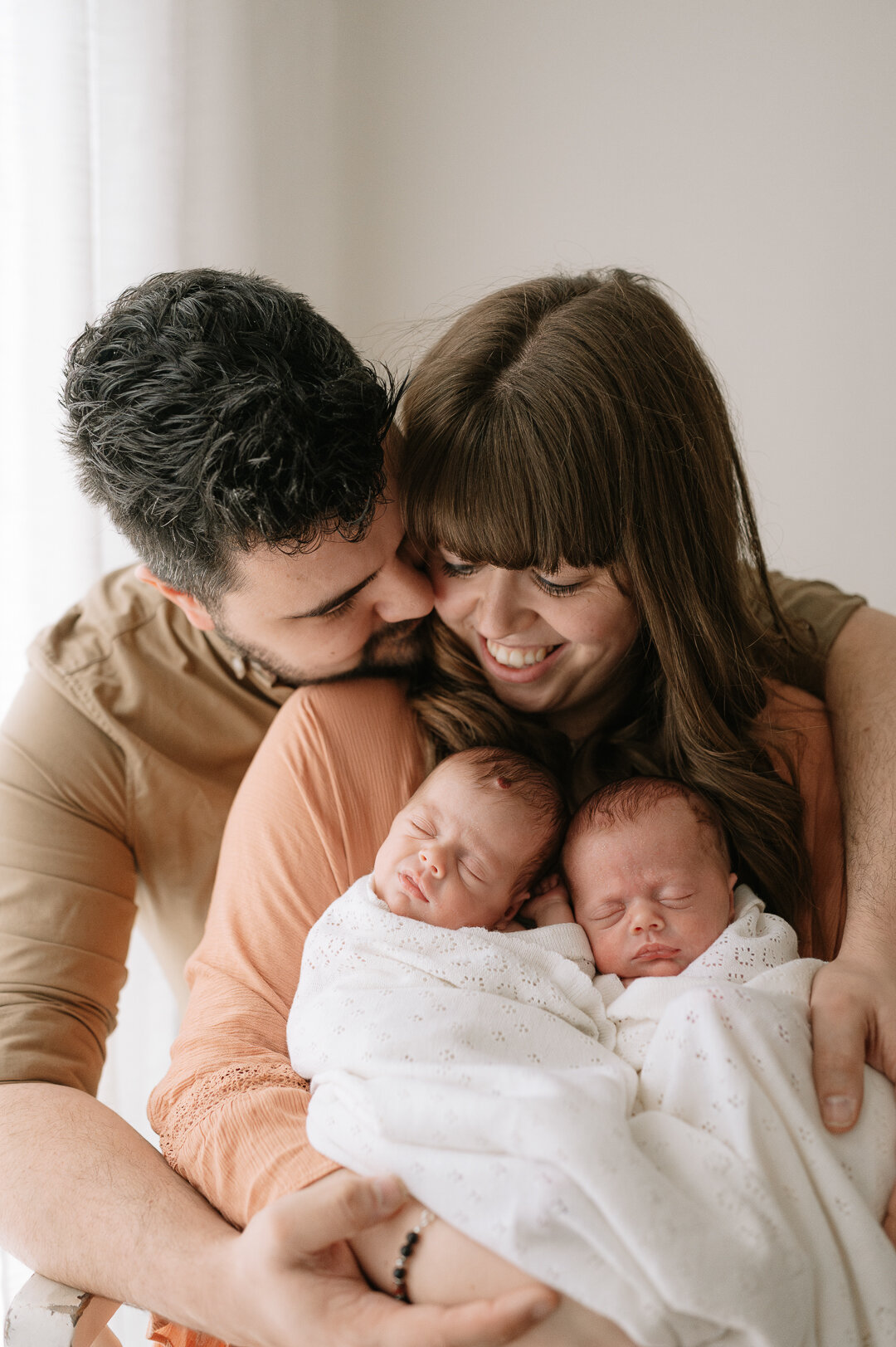 mum and dad with twin girls taken by york photographer
