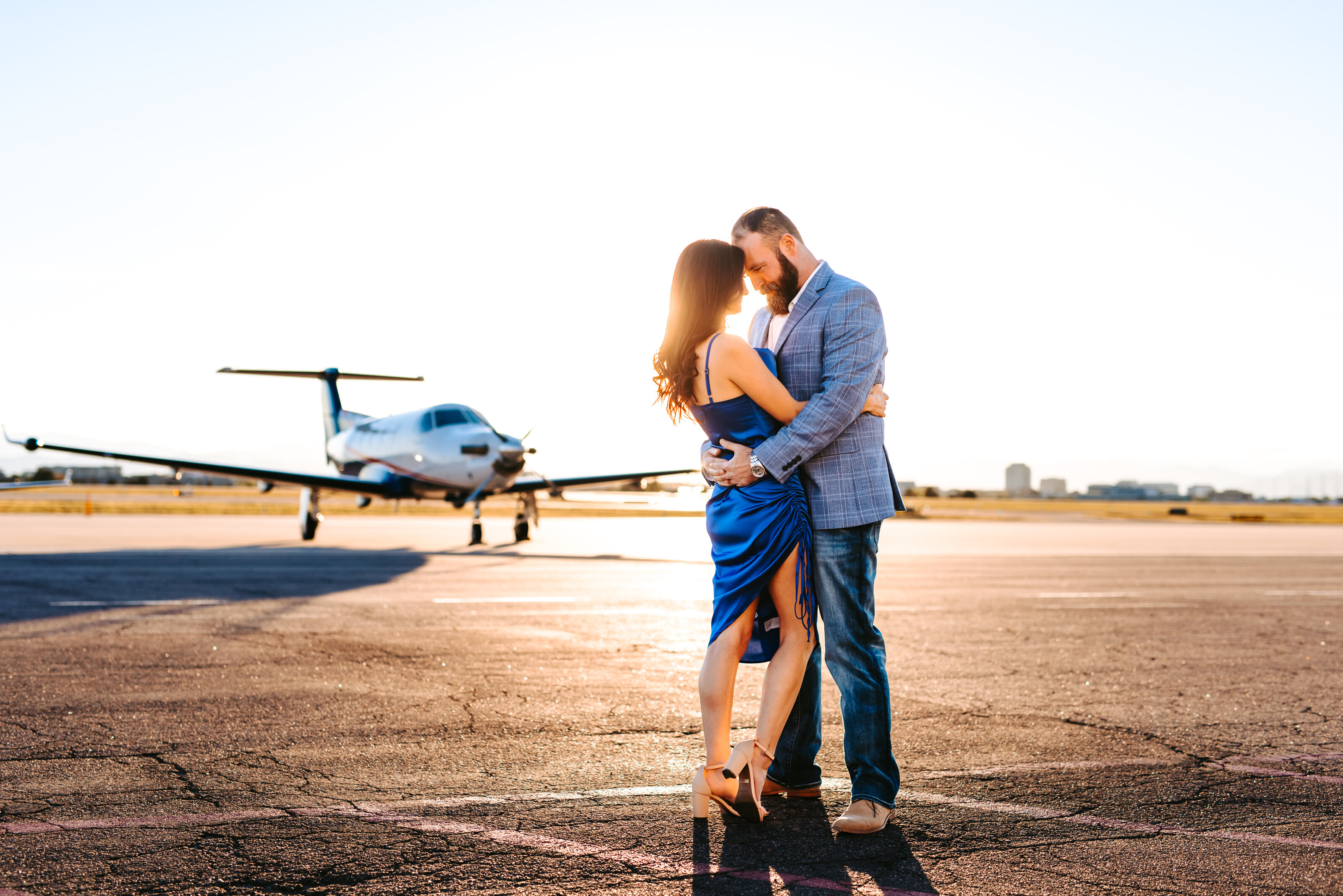 Couple on the tarmac of an airport