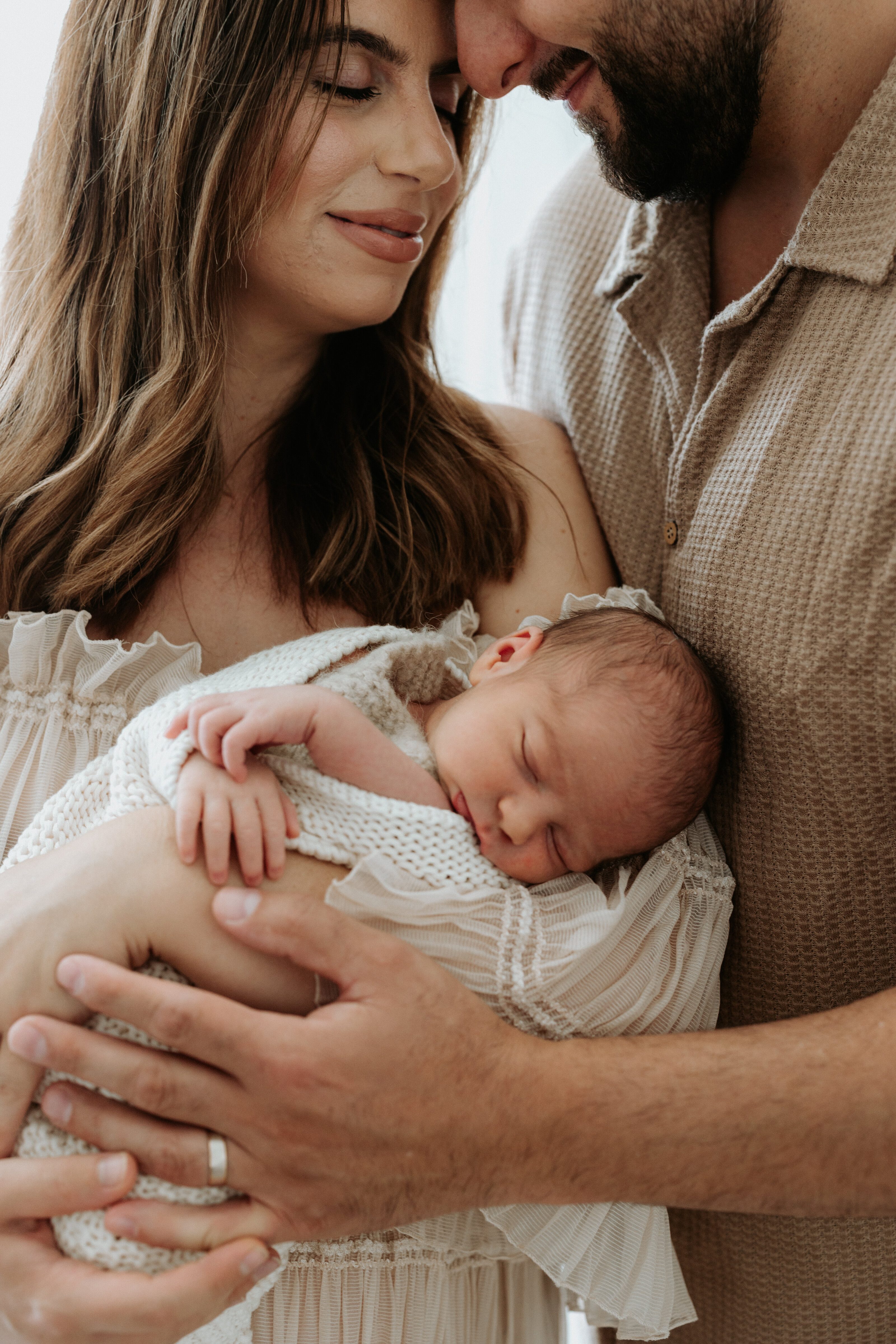Soft and minimal newborn lifestyle session indoors in Perth