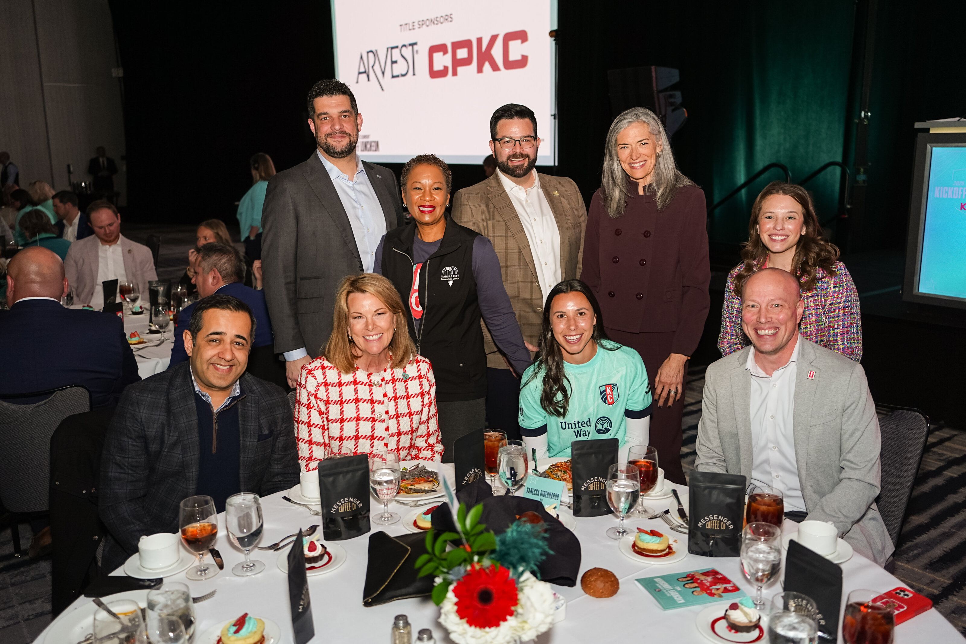 kansas-city-event-photography-0077-guests-smiling-at-banquet-table