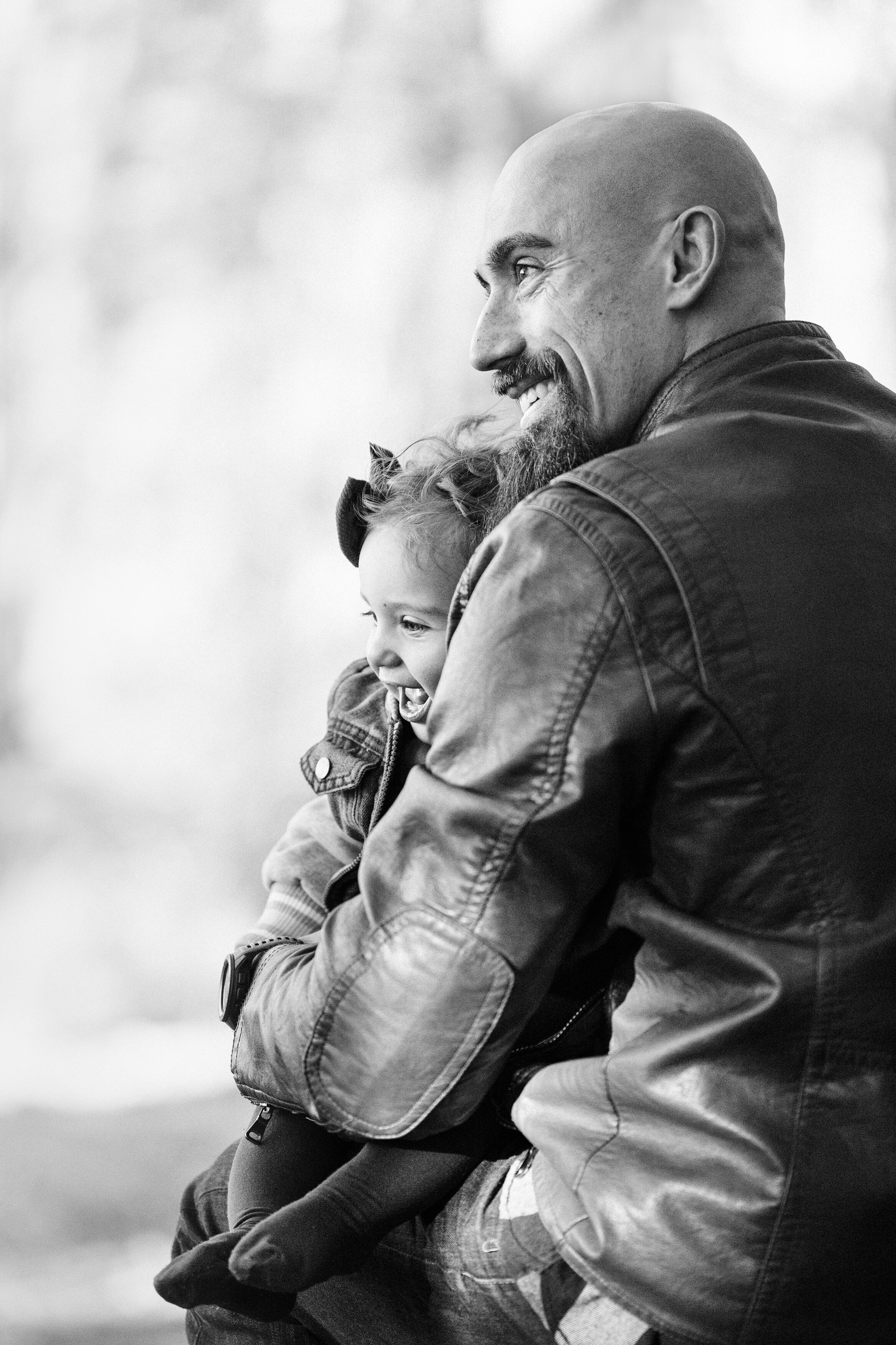 father and child laugh for photos during family shoot in Hamilton, New Jersey