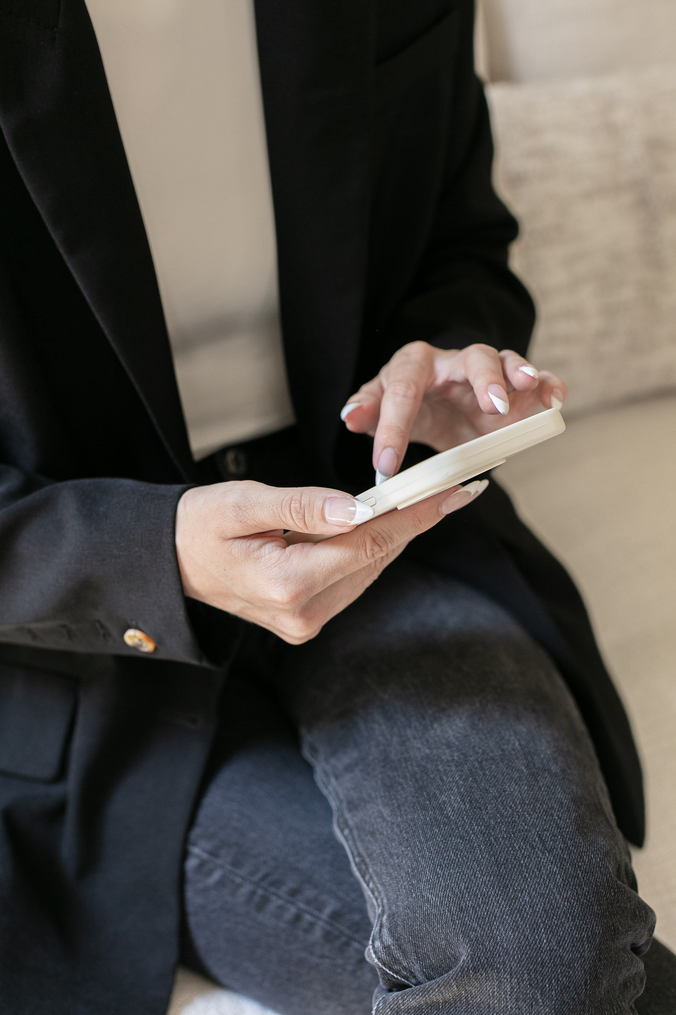 Close up photo of girl working on her phone
