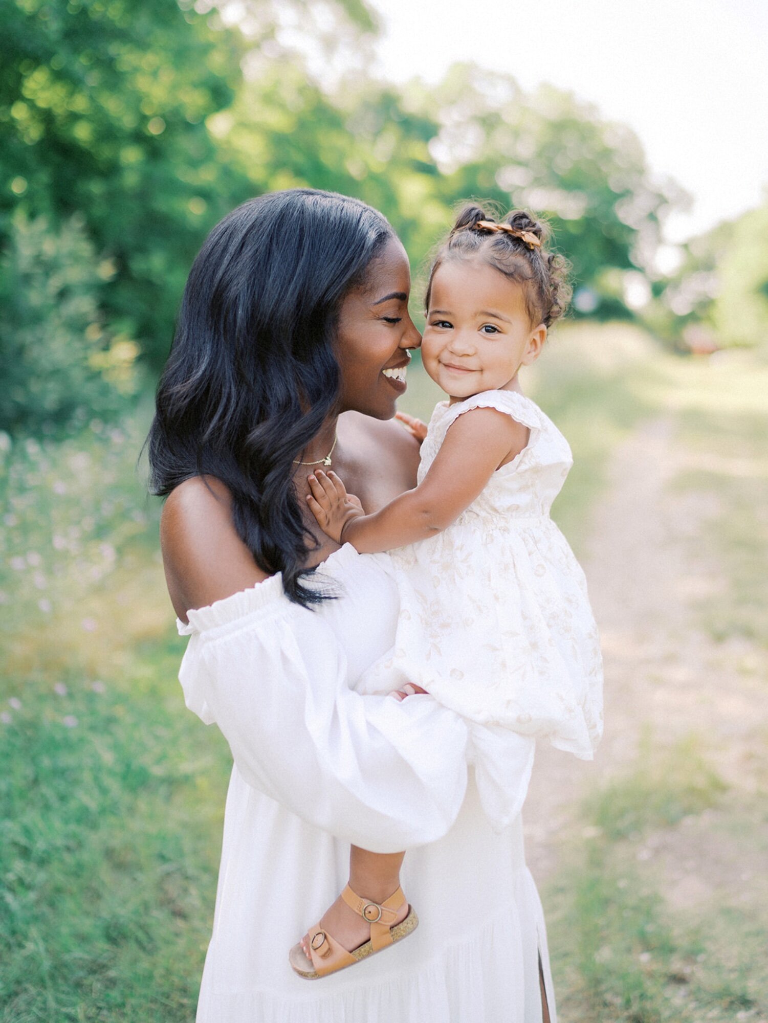 Maternity session with mother and little girl in Dallas Texas