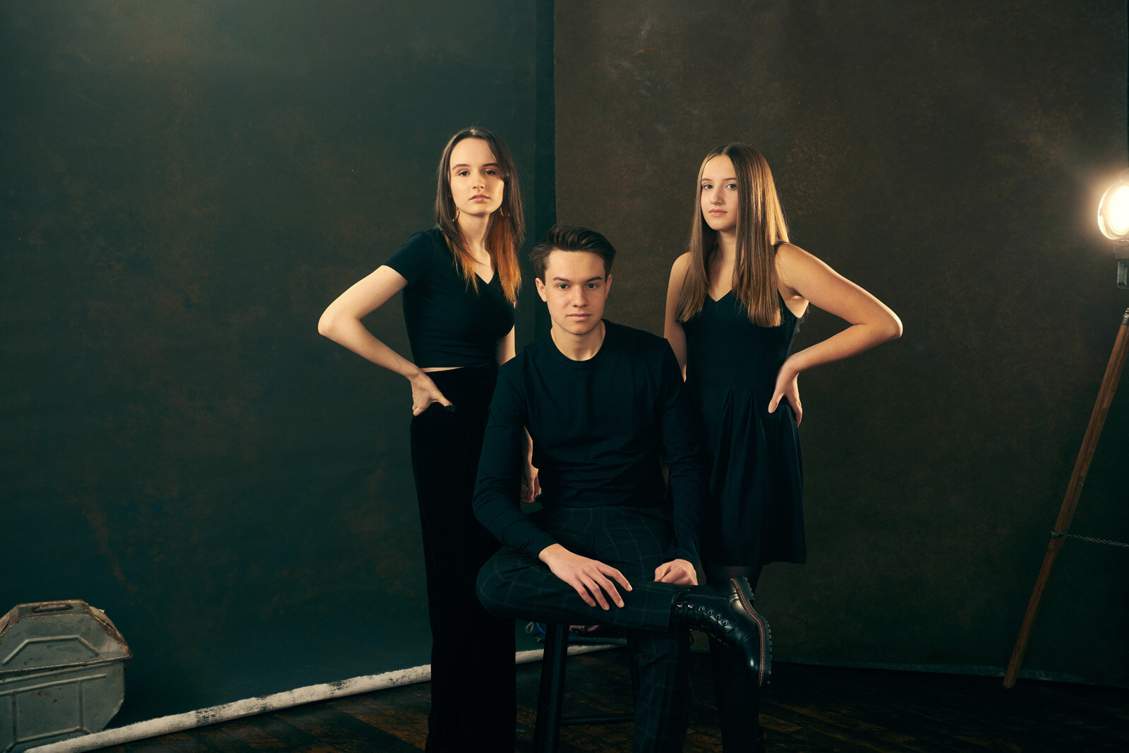 Elegant Family Portrait of Three Siblings in a Studio Setting-20
