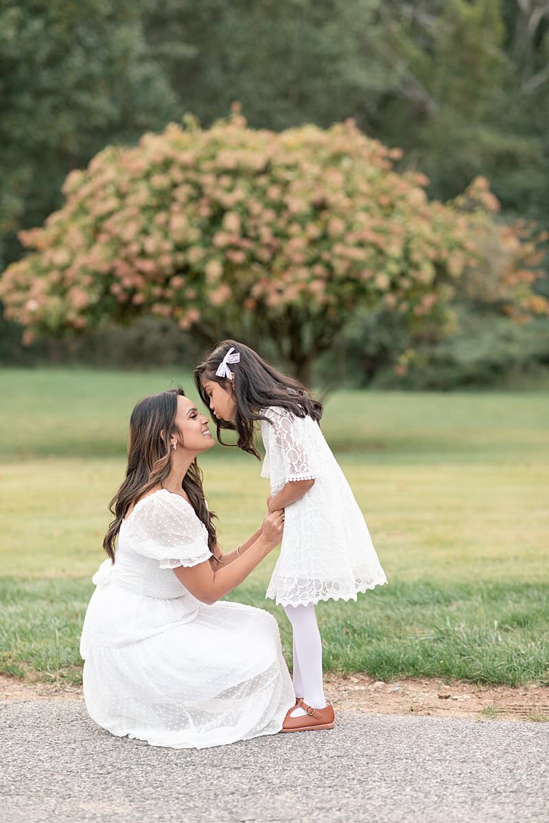 Mom and daughter interacting for outdoor Maryland Family Photos