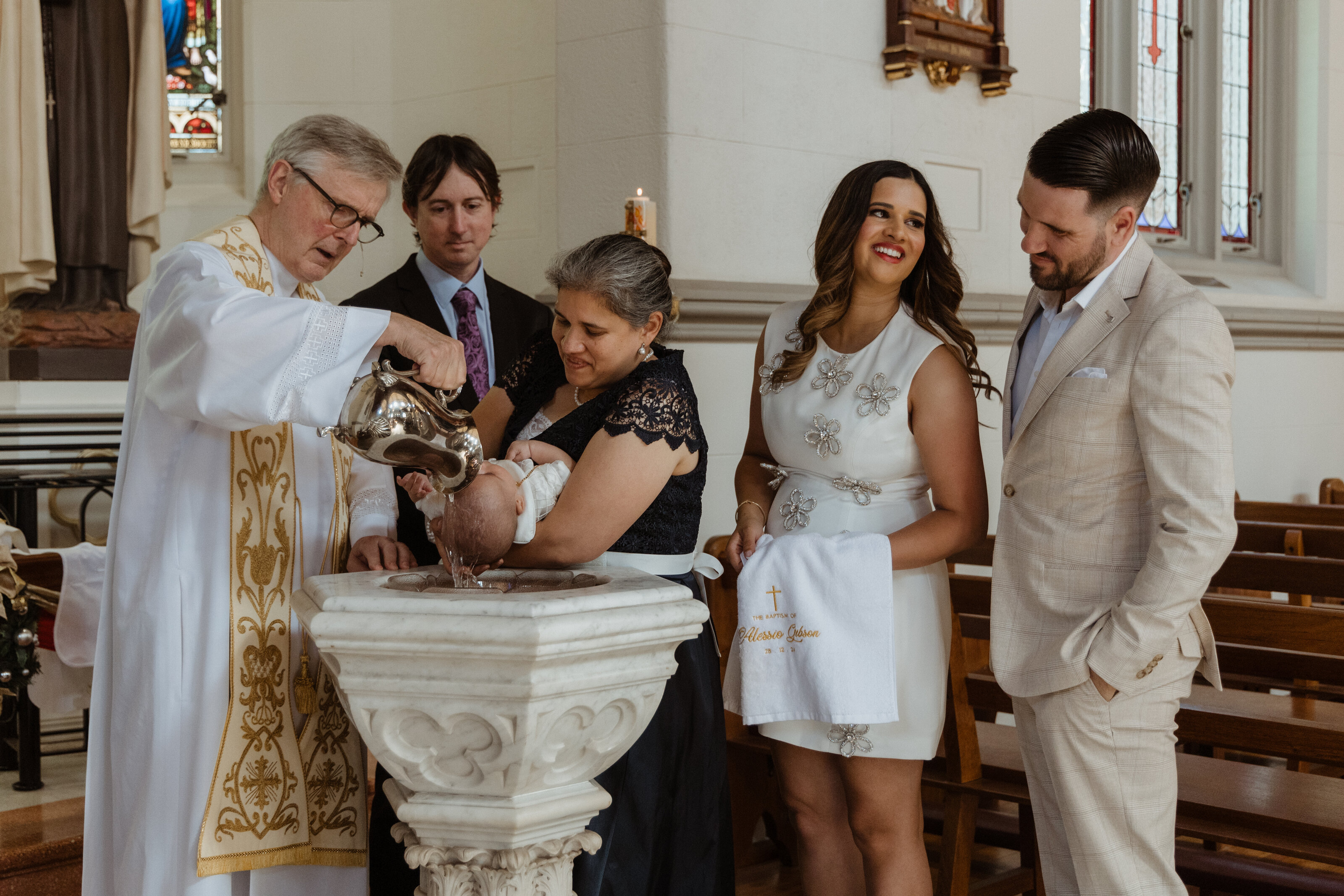 Family celebrating a baby's christening day in Perth
