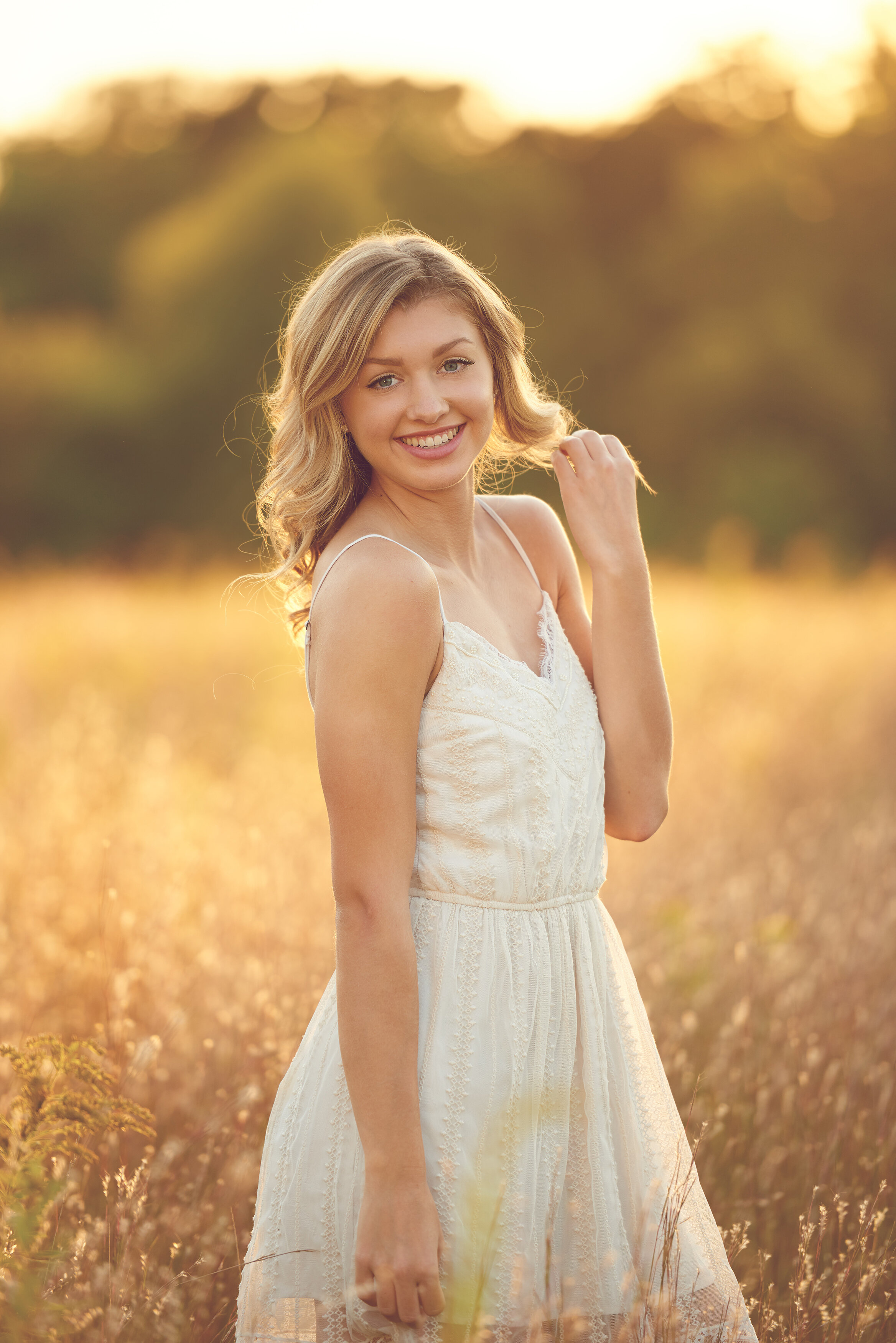 bright senior photos in wheat fields7