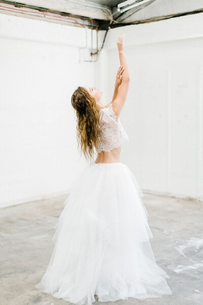 reaching for the stars pose-braids and bohemian style waves