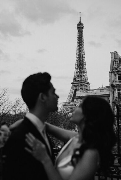 couple dancing in front of eifle tower