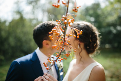 wedding party poses for portrait rustic and outdoors