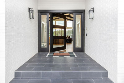 Thoughtfully designed entryway with custom storage and curated finishes.