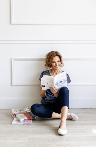 angie reading a money mindset book