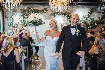 618 Restaurant | Couple walking down the aisle just married during wedding | Freehold, New Jersey