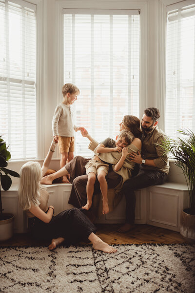 A photo of Carley Apli's family at home, Family photography training uk
