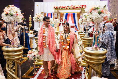 Kansas City Wedding Photographer, traditional Indian wedding, bride and groom walking up the aisle