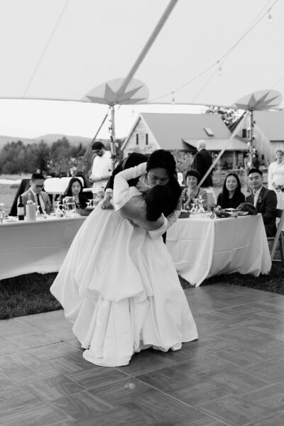Black and white photo of couple dancing at Stowe Vermont Wedding captured by Wedding photographer Sincerely Liz