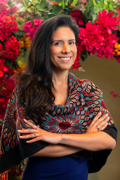 Founder of Bella Gardens dressed in branded colors providing toddler education with years of expertise in early childhood education in East Dallas, Dallas TX.