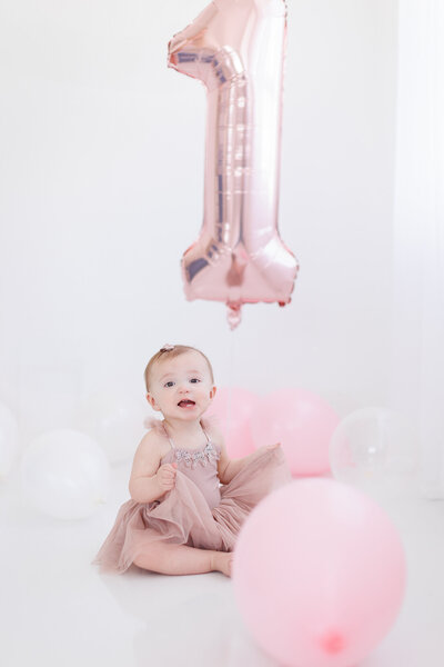 One year old baby in Boise portrait studio.