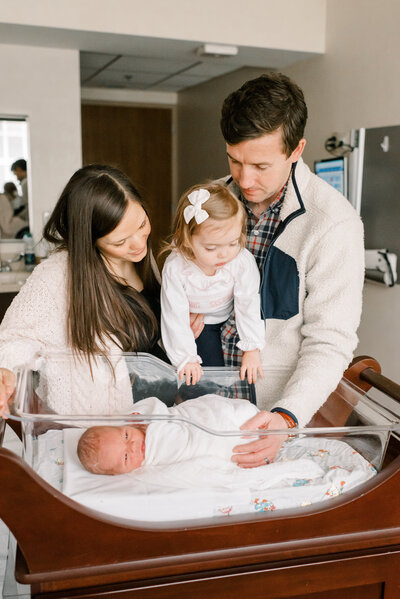 A little on meeting their new baby sibling at the hospital | Lindsay Reed Photography Fresh 48