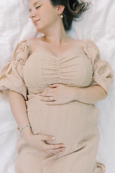 A portrait of a pregnant woman during a styled maternity session at Focal Point Studio in Richmond, Virginia.