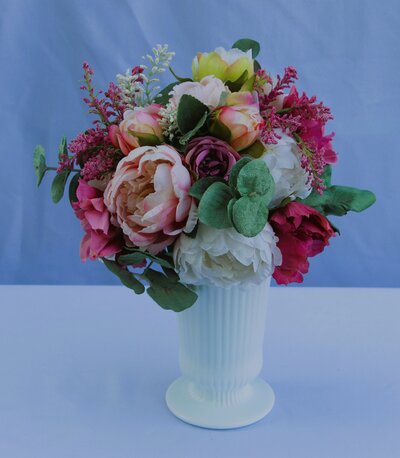milk glass floral arrangement
