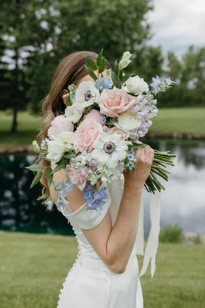 Bride with red lipstick and white sunglasses