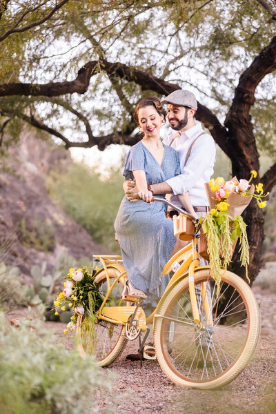 Couple enjoy a bike ride during their engagement session in Austin, Texas. Photo taken by Austin Engagement Photographers, Joanna & Brett Photography