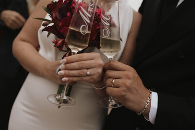 bride and groom toasting champagne at their Colorado wedding
