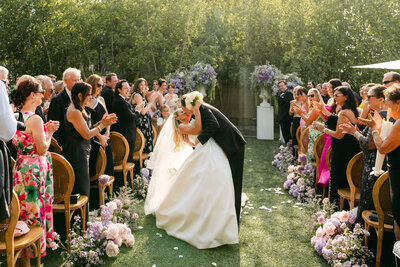 Columbus Museum of Art wedding ceremony in the Sculpture Garden with Monet-inspired florals
