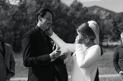 emotional bride and groom exchanging vows at their Colorado elopement 