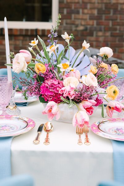 Blue and pink tablescape with florals