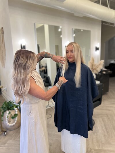 RaChelle Daniels teaching The Polished Method™ hidden-bead hair extension technique in Long Beach.