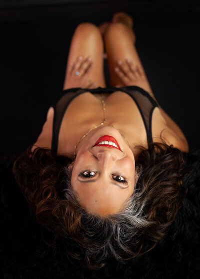 Woman upside down boudoir photoshoot