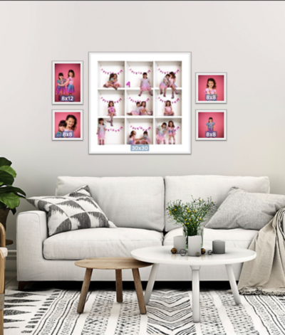a living room wall that has a five piece wall art collection on it made by larger than life photography pittsburgh using the app fundy.